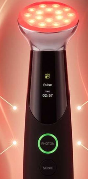 Vitera Wave display showing Pulse mode and the session timer, with the PHOTON button lit